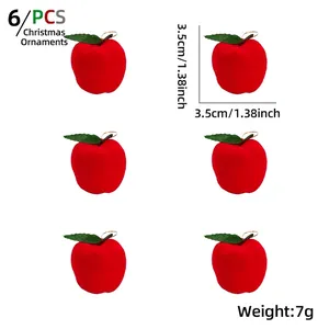 Detailed view of 6-piece red flocked foam Christmas apples with dimensions 3.5cm and gold strings