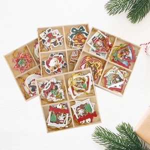 Set of 12 festive wooden Christmas tree ornaments featuring Santa, deer, and bells