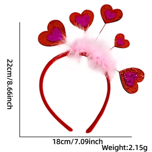 Detail view of Valentine heart headband with red sequins and soft pink feathers