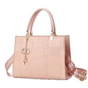 Pink faux leather tote bag with crocodile texture and decorative pearl charm strap