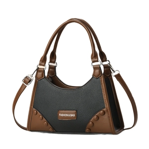 Retro two-tone hobos bag with lychee grain black leather and brown trim with rivets