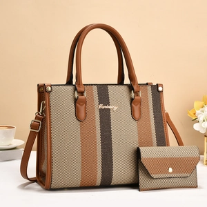 Striped tote bag and coin purse set with brown leather straps for elegant commuting