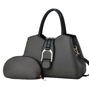 Grey woven handbag set with matching coin purse and stylish black leather handles