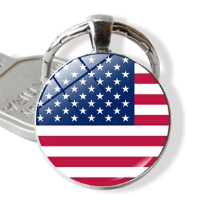 Classic American flag keychain with a glass dome and silver metal ring for keys