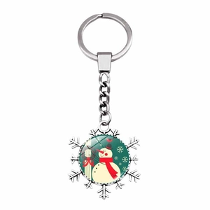 Close-up of snowflake keychain with a cute snowman illustration pendant and metal finish