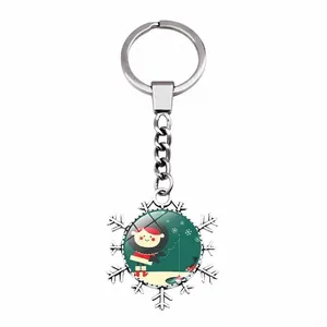 Detail of snowflake metal keychain featuring a winter fishing theme glass cabochon