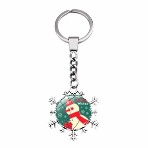 Detail of Christmas snowflake keychain with cartoon snowman and holiday wishes text