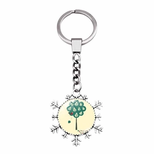 Detail of Christmas snowflake keychain with festive My True Love Gave To graphic