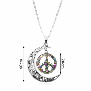 Bohemian silver crescent moon necklace with colorful butterfly peace symbol pendant