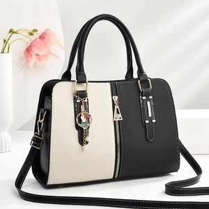 Sac à main élégant bicolore à grande capacité avec pendentif perle et design vintage chic