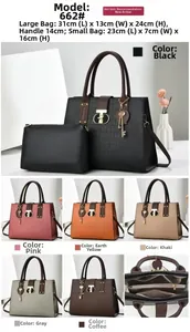 Detail view of large crocodile texture tote bag and matching inner pouch with metal lock