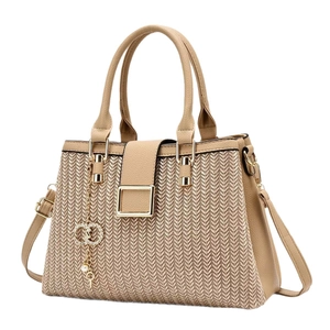 Khaki woven leather handbag with a gold buckle and detachable shoulder strap for women