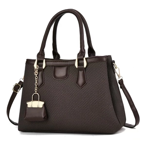 Fashionable dark brown woven tote bag with leather trim and adjustable shoulder strap