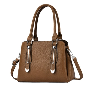 Deep brown litchi pattern leather tote bag with silver hardware and shoulder strap