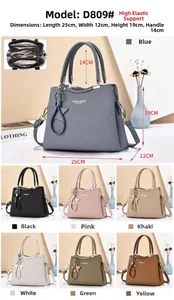Detailed interior compartments and textured leather finish of this shoulder handbag