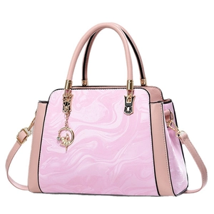 Pink marble pattern faux leather handbag with gold floral pendant and top handles