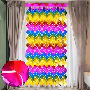 Detail of colorful diamond foil curtain showing the self-adhesive tape for party decor