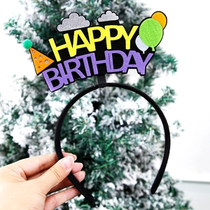 Close-up of glittery Happy Birthday headband with colorful felt party hat and balloon