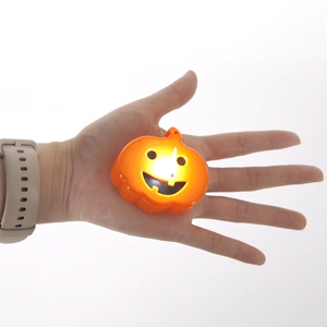 Halloween led pumpkin lamp held in hand with warm glow for party decoration