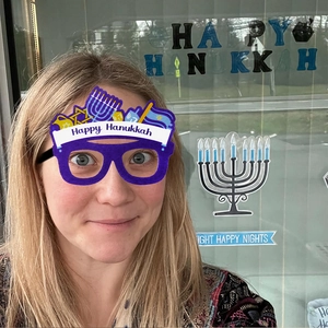 Hanukkah party glasses with Star of David and Menorah felt decorations for photography