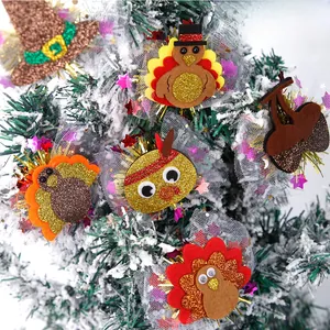 Macro detail of turkey and acorn hair clips on a festive autumn branch setting