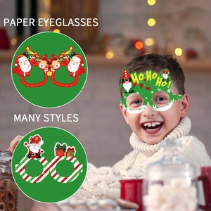 Various Christmas paper glasses featuring Santa and Reindeer on a smiling child model