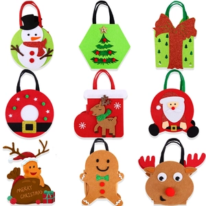 Collection of nine festive felt Christmas gift bags featuring reindeer and snowman designs