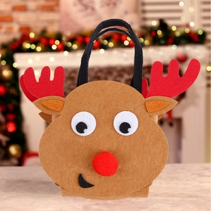 Detail of felt Christmas reindeer gift bag with 3D antlers and red nose decoration