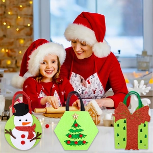 Three-piece set of festive Christmas non-woven gift bags with snowman and reindeer designs