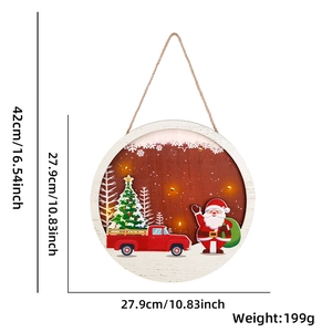 Lighted wooden Christmas door sign featuring Santa, red truck, and LED snow scene