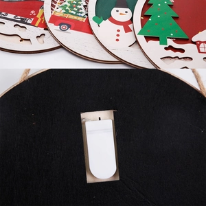 Detail of wooden Christmas door sign with LED lights and battery box on the back