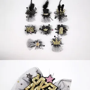 Detail of 2026 New Year gold and black glitter crown hairpins for party celebration