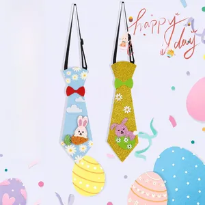 Detail of Easter bunny ties in blue floral and glitter gold with adjustable straps