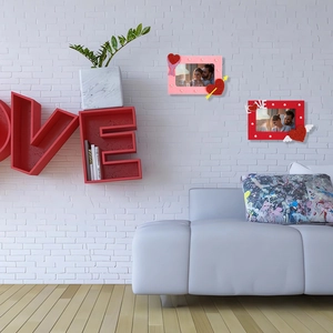 Detail of red and pink heart-shaped Valentine frames with glitter accents and pearls