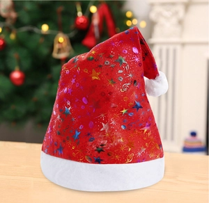 Close-up of red Christmas hat with laser star patterns and white plush trim details