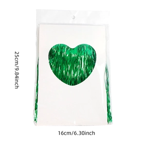 Close-up of emerald green foil fringe curtain in packaging with 25x16cm dimensions