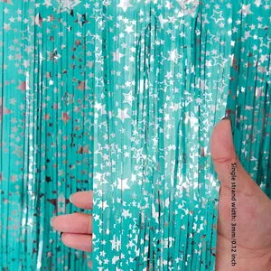 Detail view of teal foil fringe curtain with silver stars and 3mm strand width detail