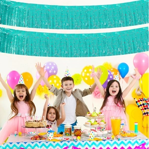Detail of tiffany blue metallic foil fringe curtain decoration for birthday parties