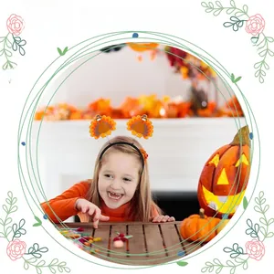 Toddler wearing festive turkey headband with bouncy springs for Thanksgiving party fun