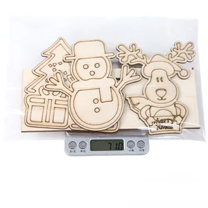 Detailed view of DIY wooden Christmas ornaments set on an electronic scale weighing 71.0g