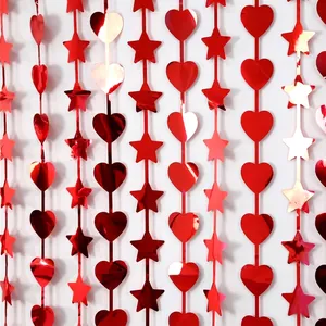 Red heart and star shaped tinsel curtain backdrop for Valentine wedding party decor