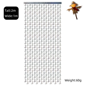 Detail of silver laser tassel curtain with western boot sequins for party decor