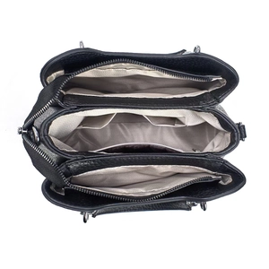 Detailed top view of black pebble leather handbag featuring three internal compartments