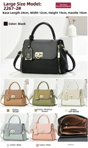 Detailed view of the large sheepskin tote with golden ring buckle and textured finish