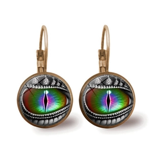 Detailed close-up of retro dragon eye earrings with iridescent glass cabochons
