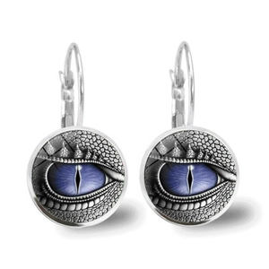 Detailed view of dragon eye earrings with realistic blue iris and silver-tone hooks