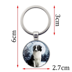 Border Collie glass gem keychain with silver metal ring and artistic snow night design
