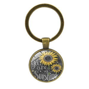 Porte-clés tournesol rétro en bronze avec texte You Are My Sunshine et pendentif en verre