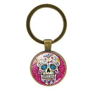 Vintage bronze sugar skull keychain with pink glitter and glass pendant for keys