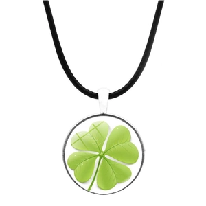 Detail of silver clover pendant with green glass stone and black cord necklace